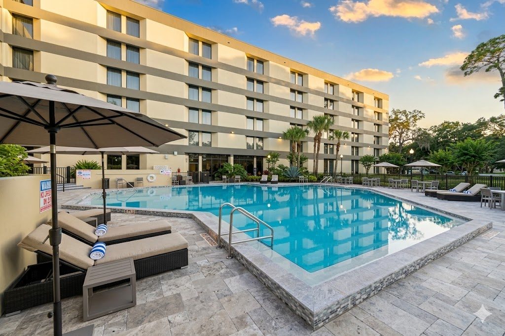 Outdoor pool at DoubleTree by Hilton Orlando East - UCF Area